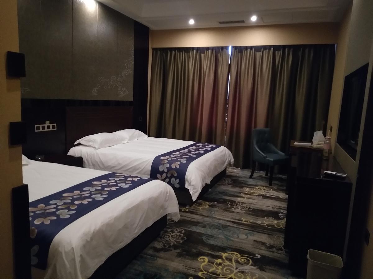 Harbin Aimei Hotel Buitenkant foto